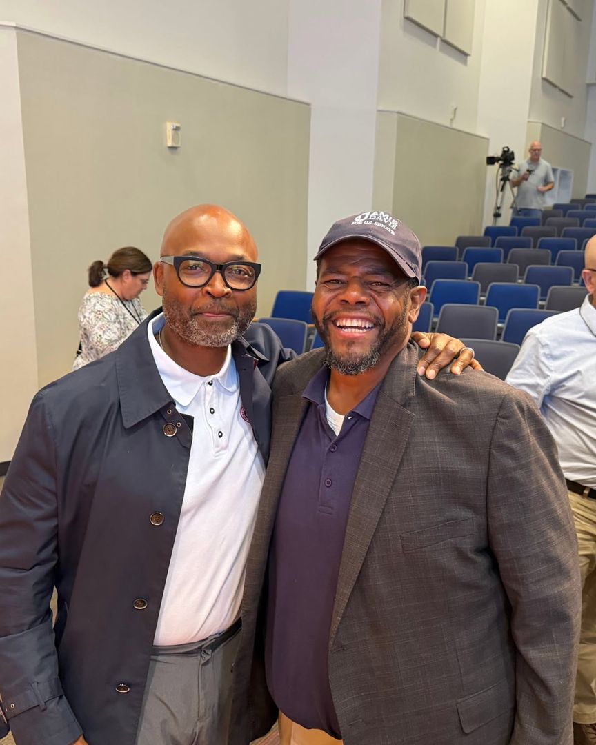 Jamie Davis with a supporter at a community event