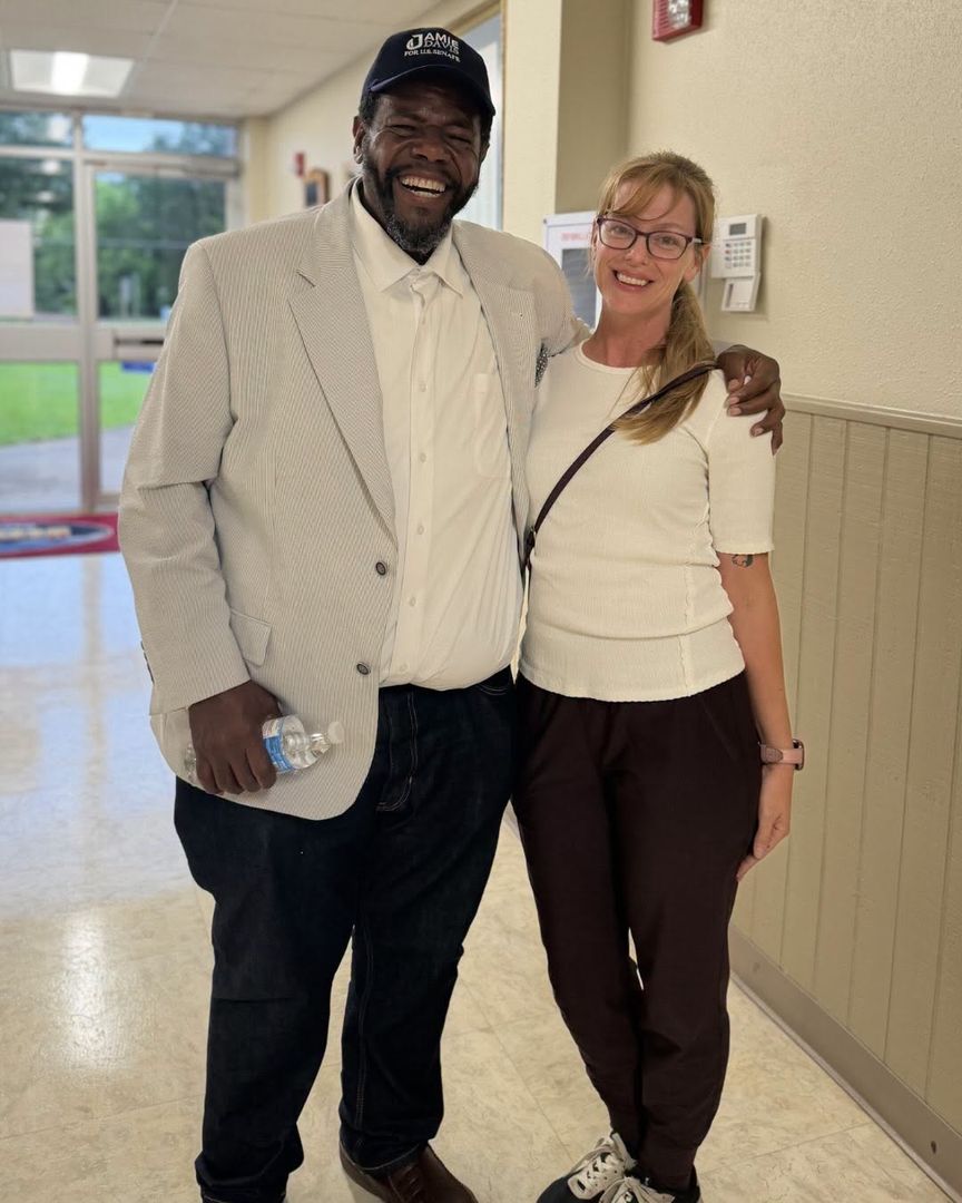 Jamie Davis hugging a supporter after an event