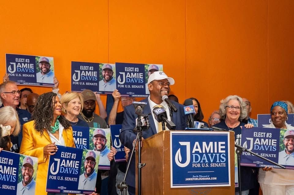 Jamie Davis at an election-night rally with supporters